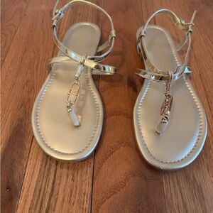 Guess Gold Flat Sandals with Metallic Design